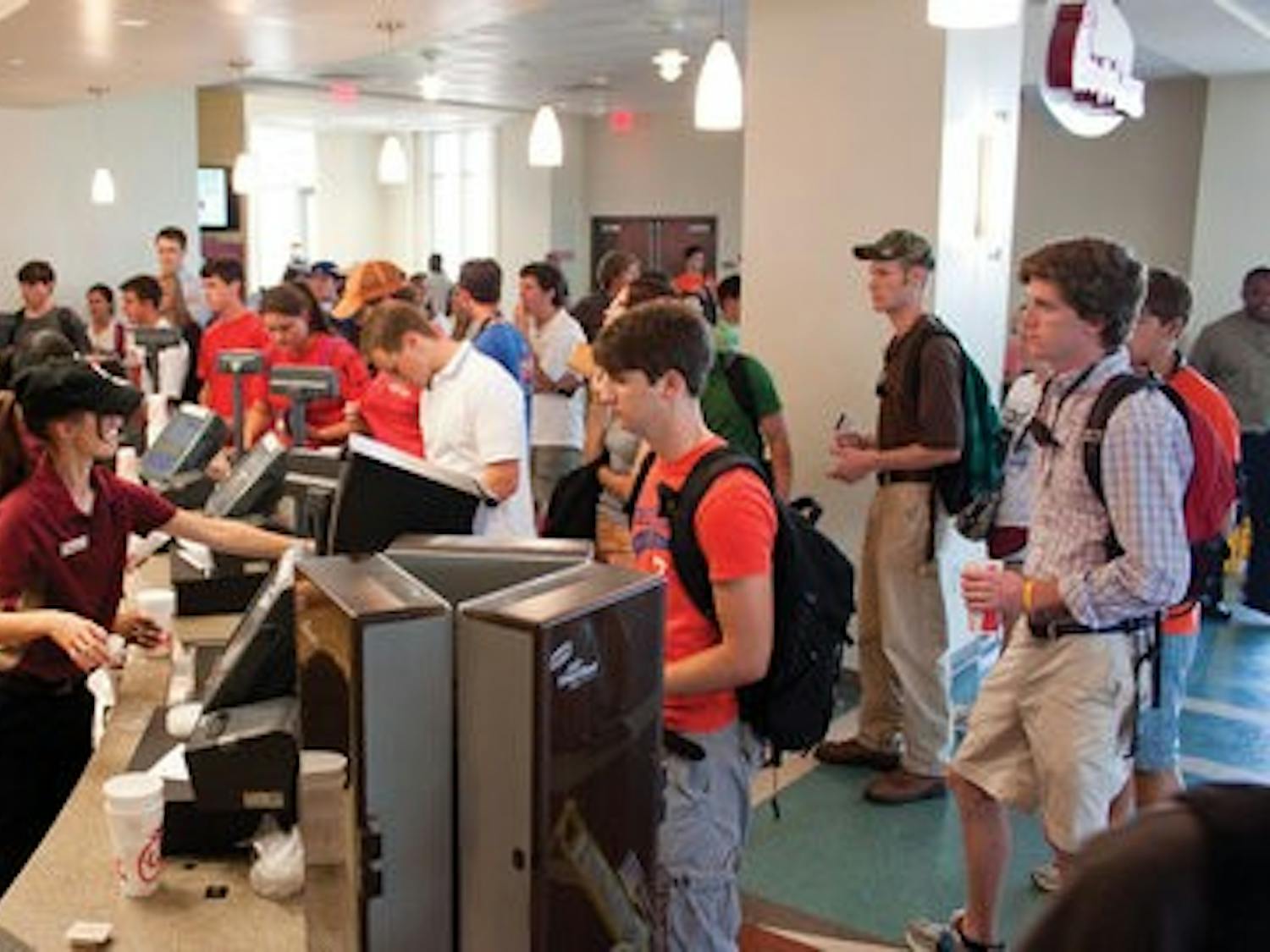 Students wait in line to get food from the Chic-Fil-A in the Student Center. (Emily Adams / PHOTO EDITOR)