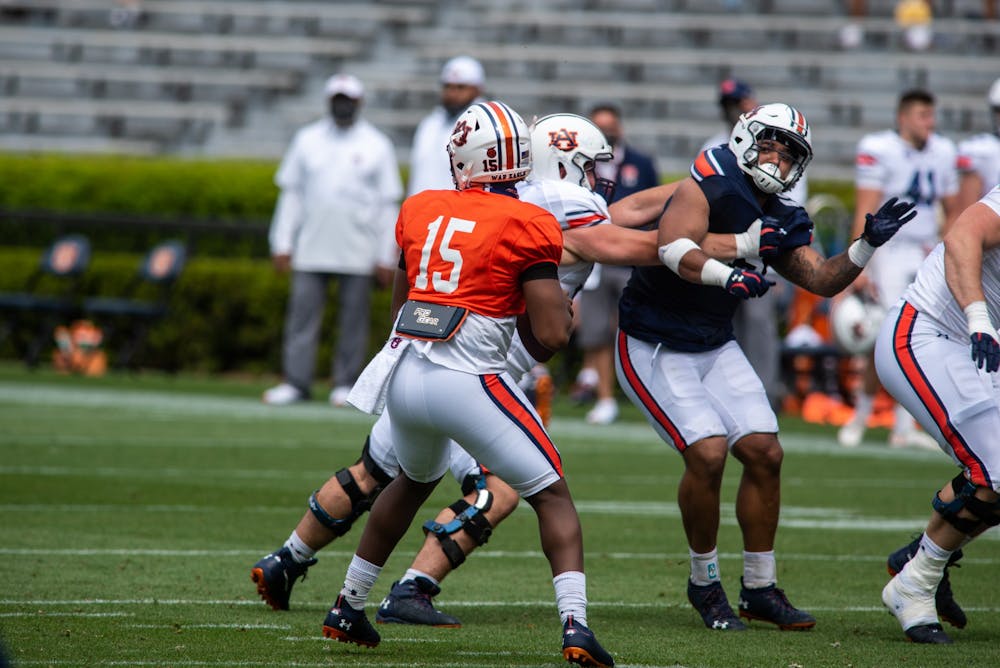 Chayil Garnett (15) looks to pass the ball during the 2021 Auburn Football A-Day scrimmage, on Saturday, April 17, 2021, in Auburn, Ala. 
