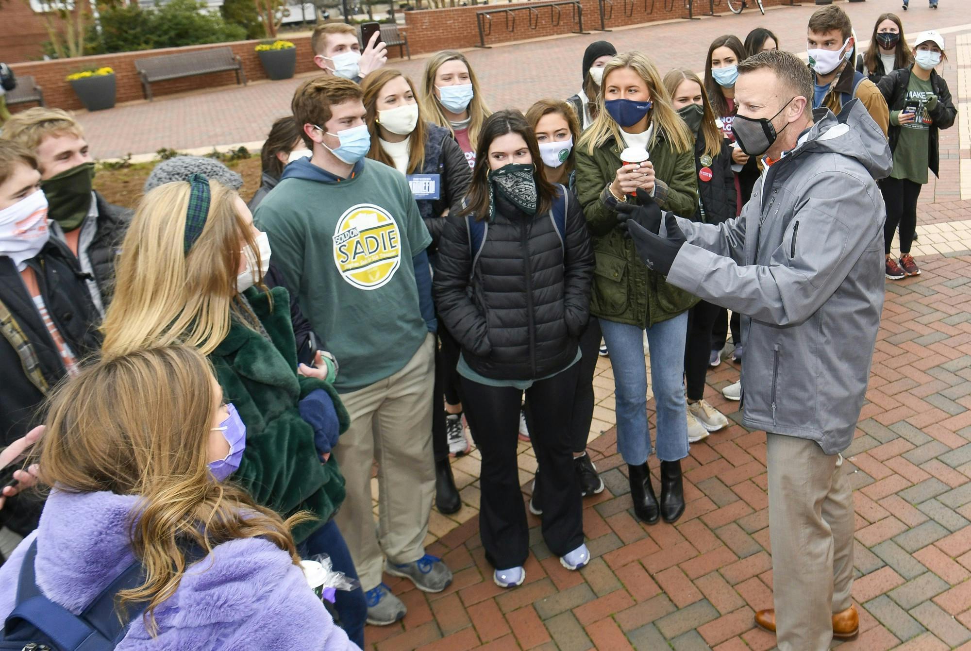 AU FB Harsin and Aubie on concourse 