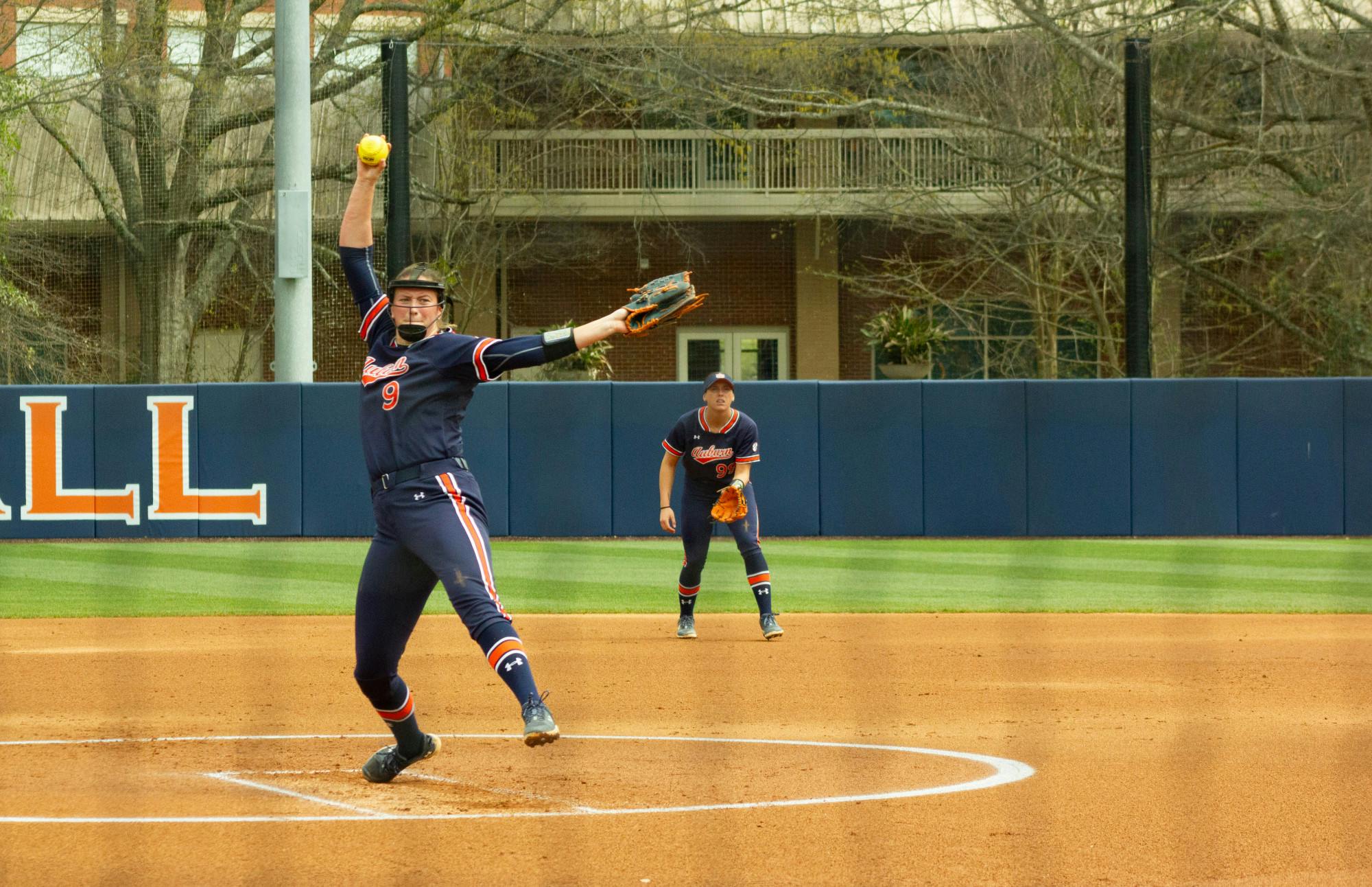 Maddie Penta (number 9) pitching for Auburn Softball vs Arkansas on March 16, 2024