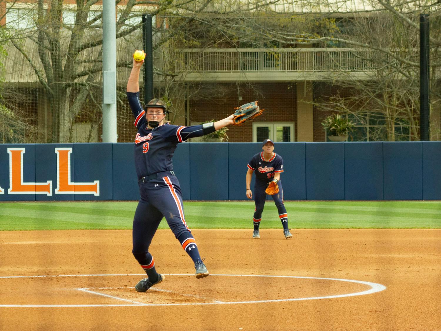 Maddie Penta (number 9) pitching for Auburn Softball vs Arkansas on March 16, 2024