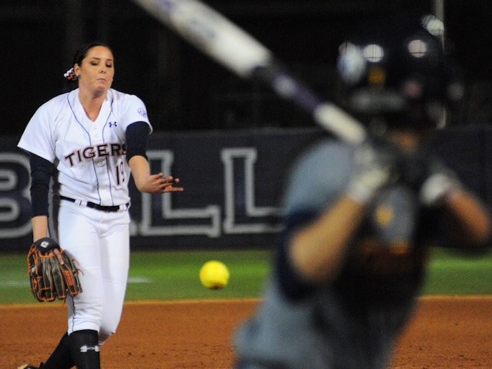 Rachael Walters #19 pitches to a UTC batter. Auburn vs UTC in Auburn, AL on Feb. 8, 2015. (Adam Sparks | Photographer)