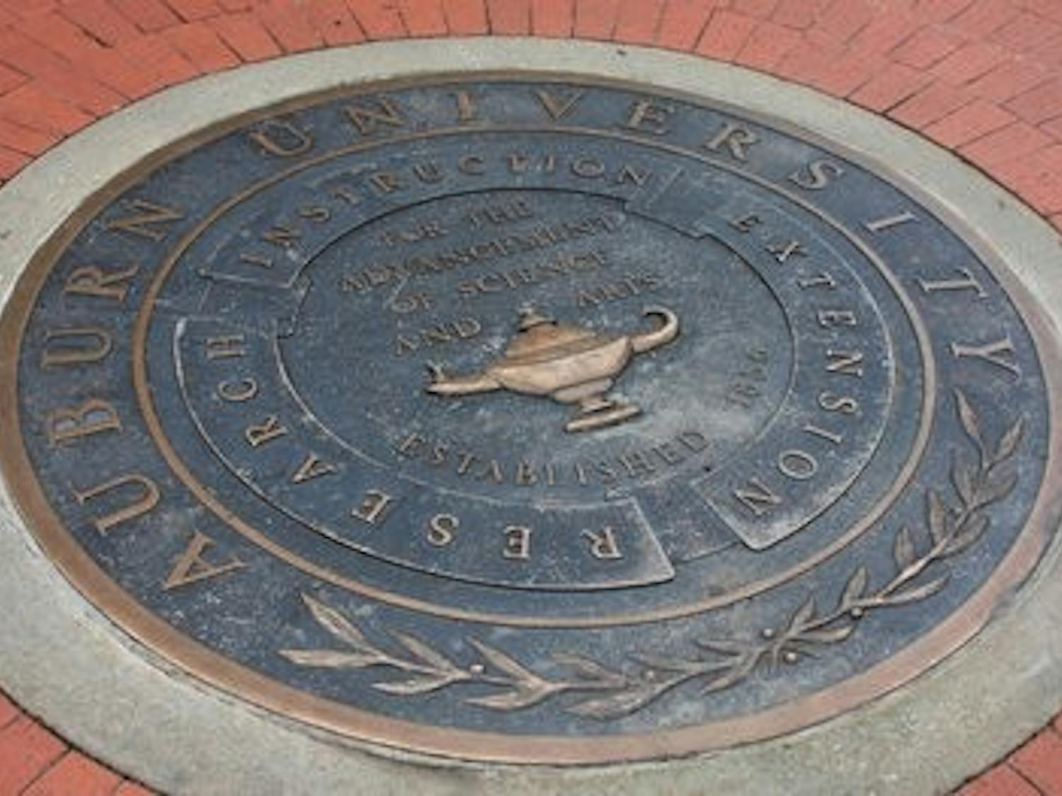 Legend has it that students who step on the Auburn seal he or she will not graduate on time or find their true love at Auburn. (Chelsea Wooten / PHOTO EDITOR)
