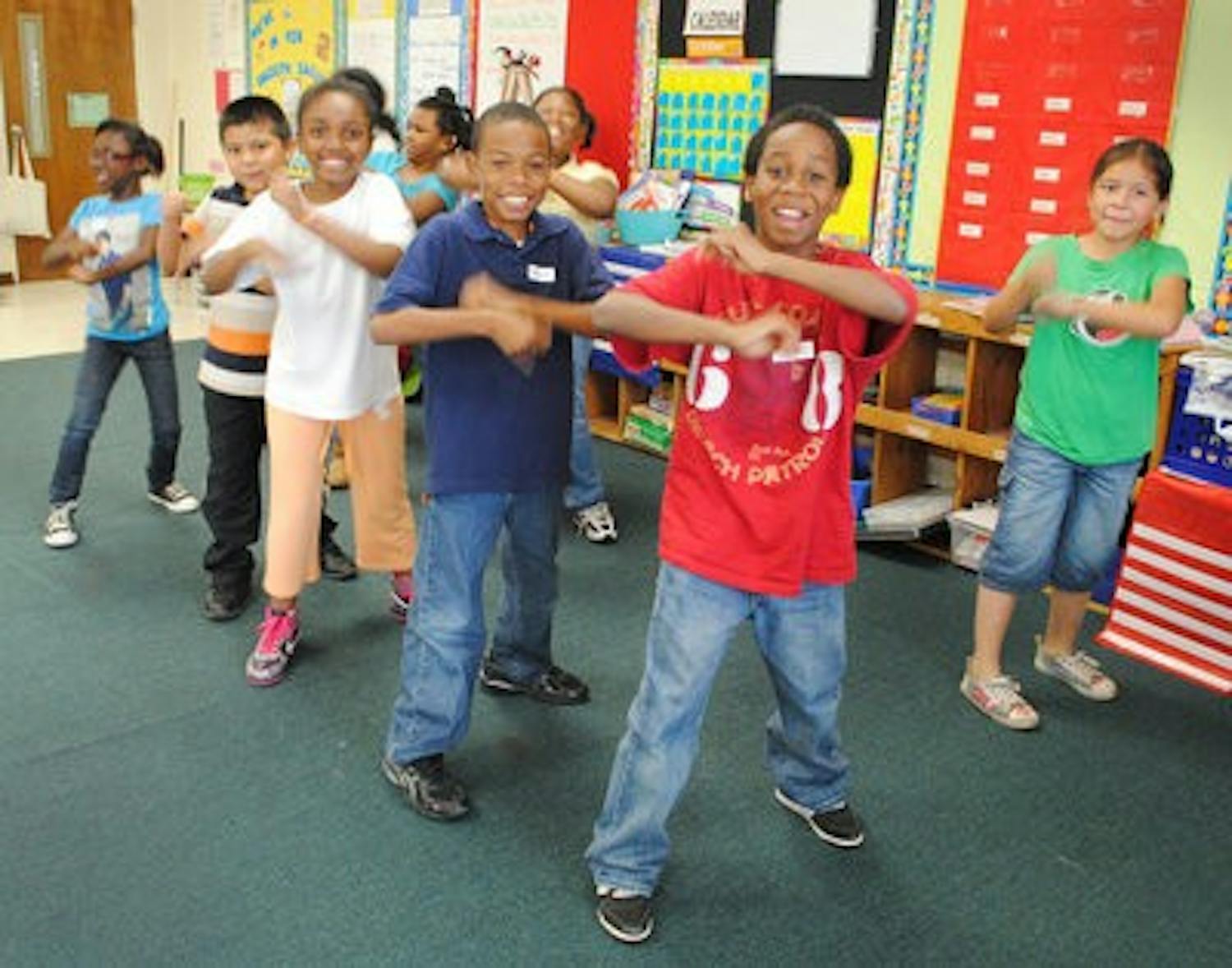 Loachapoka third-graders use their dance skills to fund their trip to Disney World. (Maria Iampietro / PHOTO EDITOR)
