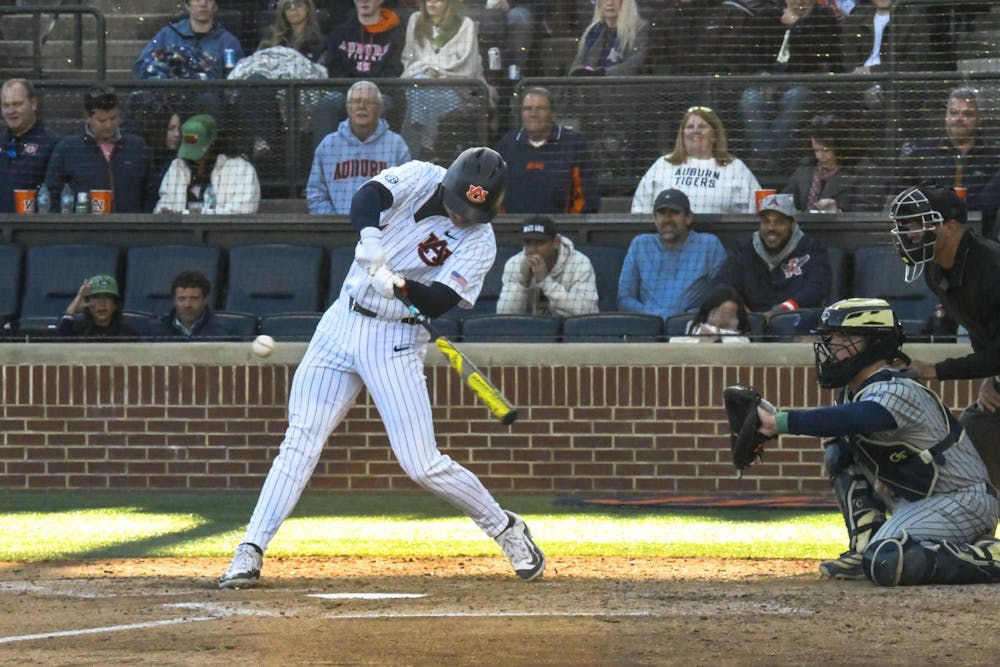 <p>Cade Belyeu (14) mid swing during the Auburn vs Georgia Tech game Tuesday, March 17, 2026.</p>