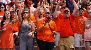 Fans at this year's games can watch with a shaker in one hand and an Ipad in the other. (Robert E. Lee / EDITOR-IN-CHIEF)