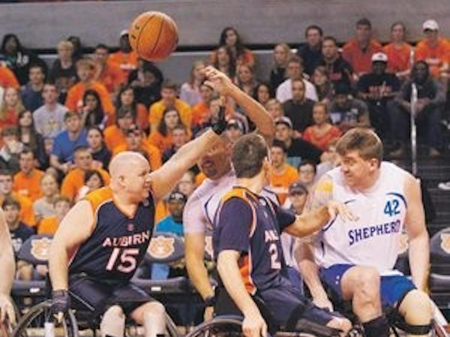 Auburn's wheelchair basketball team scrimmages against a team from the Shepherd Center during halftime of the Jan. 21 men's basketball home matchup against the University of South Carolina. (Courtesy of Jimmy Rhyne)