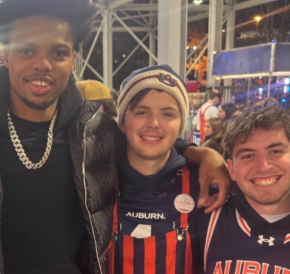 Jack Dutton (middle) with Gavin Fisch (right) and basketball star Keyshawn Hall (left).