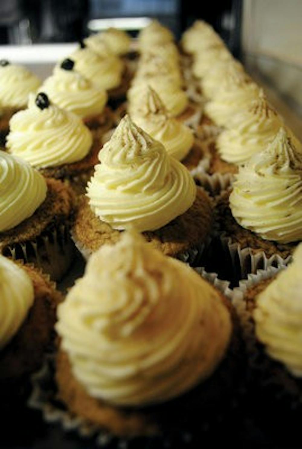 Taylor's Bakery sells a variety of cupcakes, including those with buttercream icing and a coffee bean on the top. (Maria Iampietro / Associate Photo Editor)