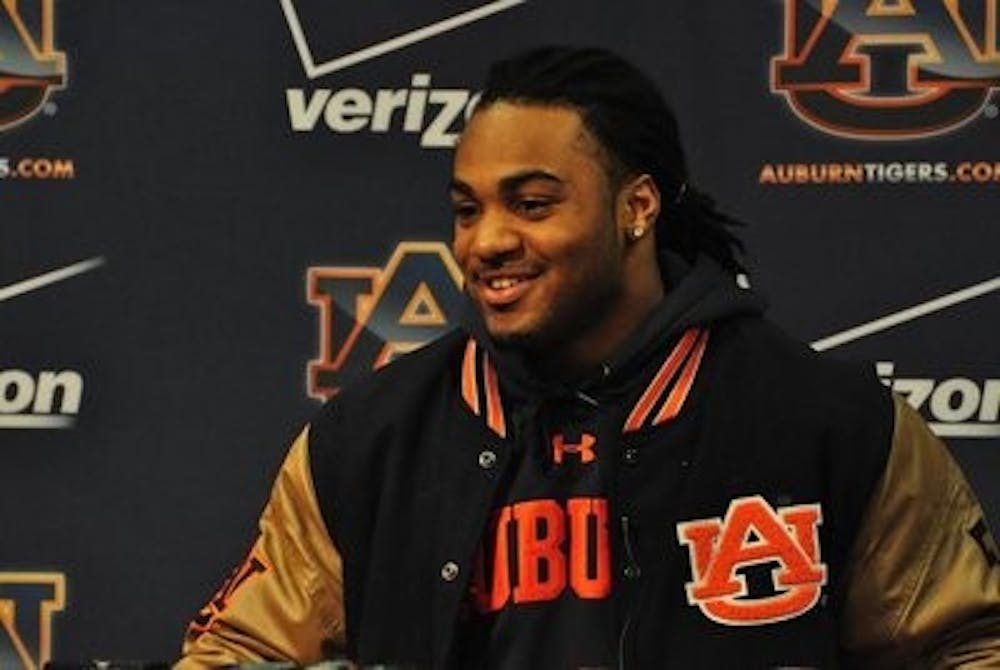 Tre Mason declares for the NFL Draft during a press conference Jan. 9, 2014. (Anna Grafton / Photo Editor)