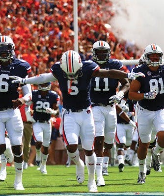 Jonathon Mincy leads the team out of the tunnel before SJSU.
