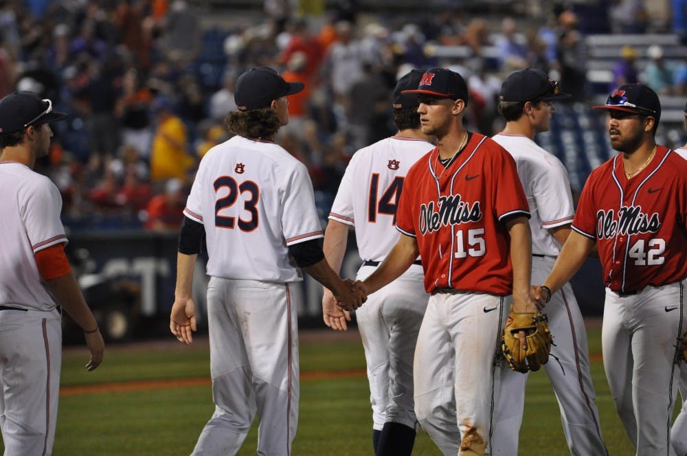 Calvin Coker shakes hands&nbsp;after Auburn Baseball vs. Ole Miss on Friday,May. 25, 2018 in Hoover, Ala.
