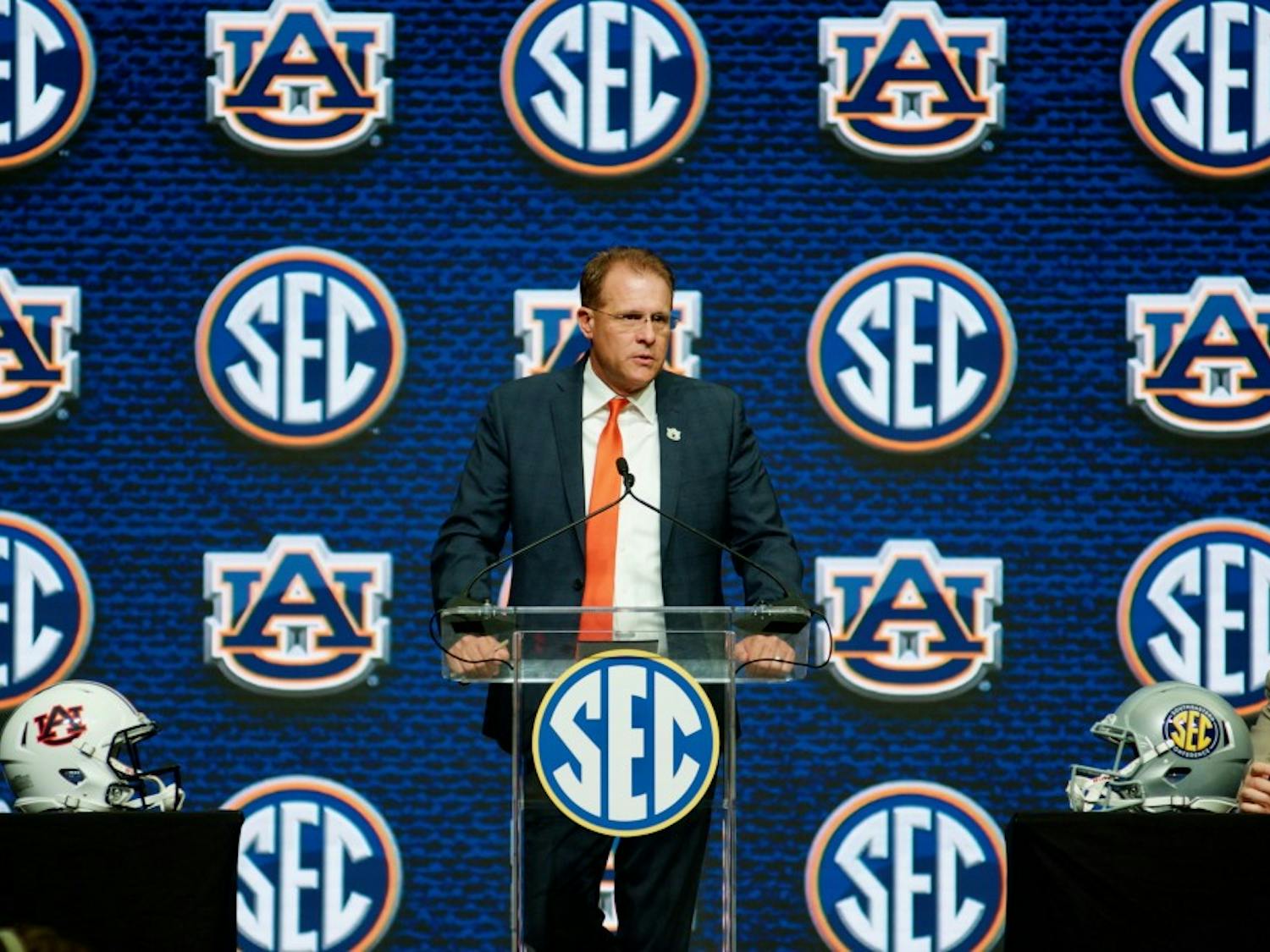 Guz Malzahn answers a question&nbsp;during an interview at SEC Media Days in the College Football Hall of Fame on Thursday, July 19, 2018 in Atlanta, Ga.