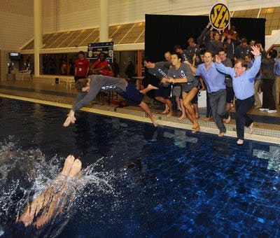 The Auburn men celebrate winning their 14th straight SEC Swimming and Diving Championship Saturday.SEC Swimming and Diving Championships in Athens, GA.,  on Saturday, Feb. 20, 2010. day 4 FINALSTodd Van Emst