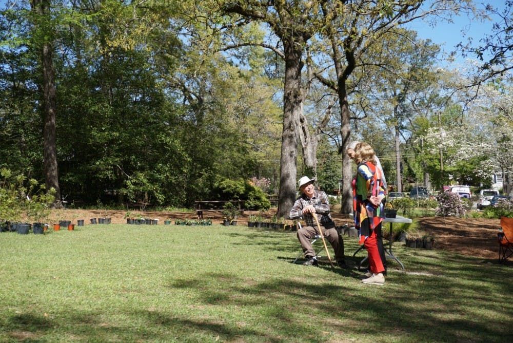 Members of the community talk during the Azalea Festival at Auburn University's Donald E. Davis Arboretum on Saturday, March 31, 2018, in Auburn, Ala.