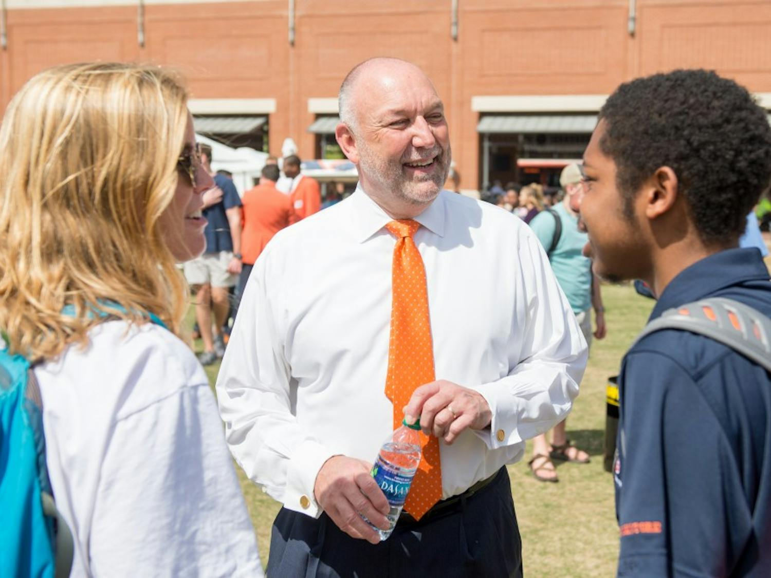 Dr. Steven Leath greets students at the student celebration for his installation, on the Student Center Greenspace in Auburn, Ala. on Wednesday, March 28, 2018.