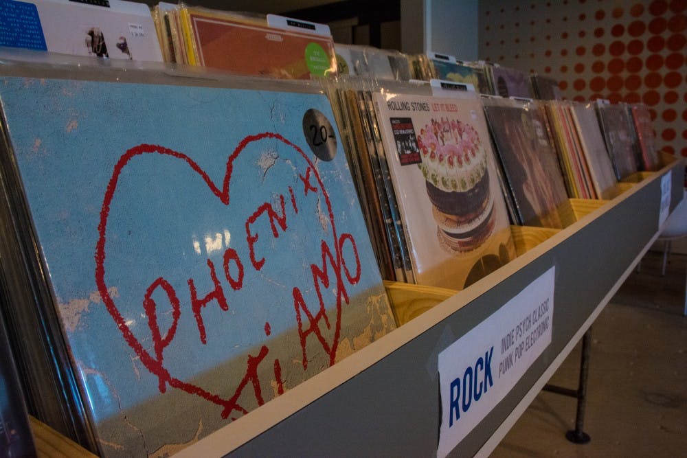 Records sit in bins at 10,000 Hz Record store in Opelika, Ala. on Tuesday, Aug. 21.