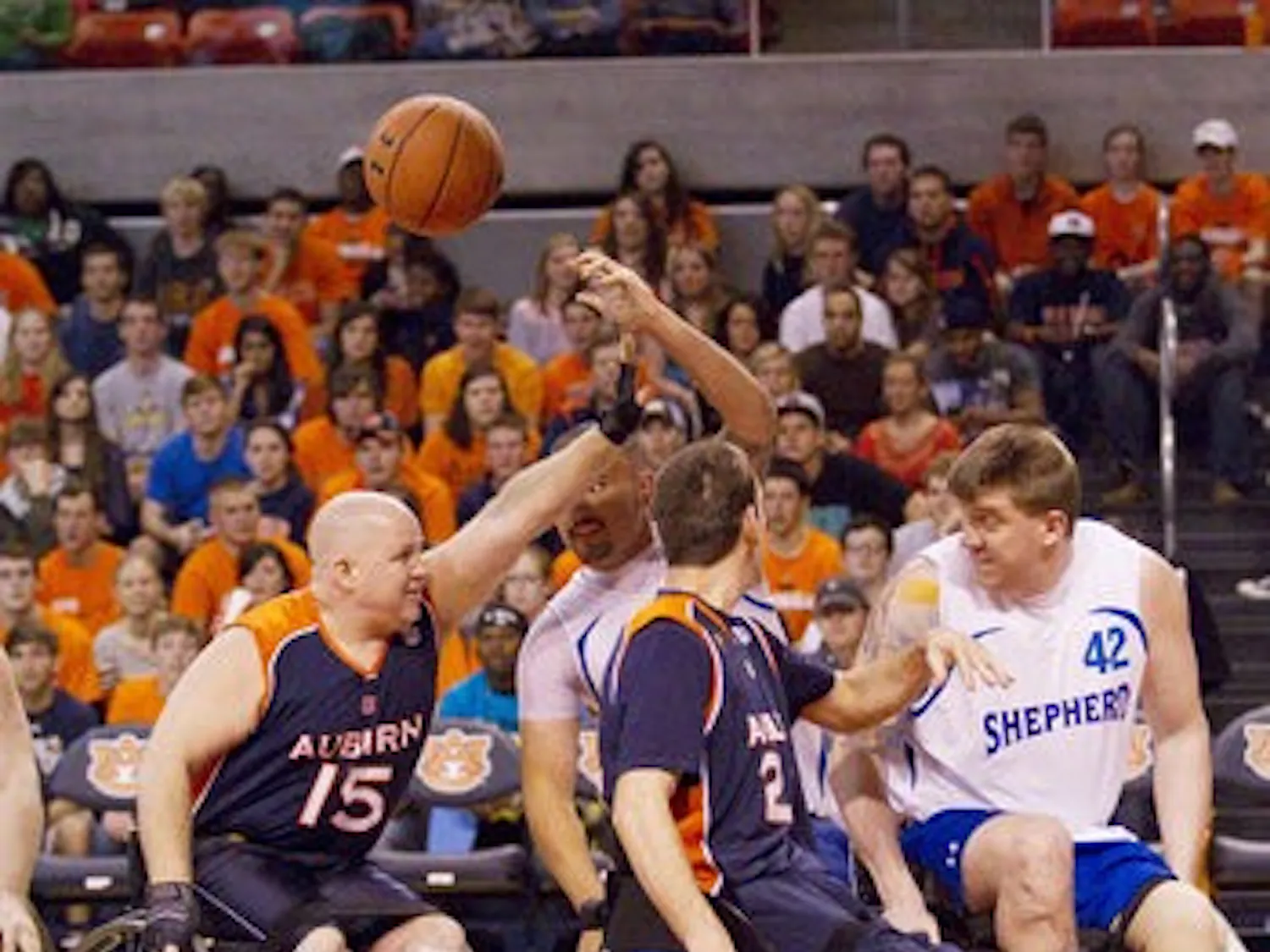Auburn's wheelchair basketball team scrimmages against a team from the Shepherd Center during halftime of the Jan. 21 men's basketball home matchup against the University of South Carolina. (Courtesy of Jimmy Rhyne)