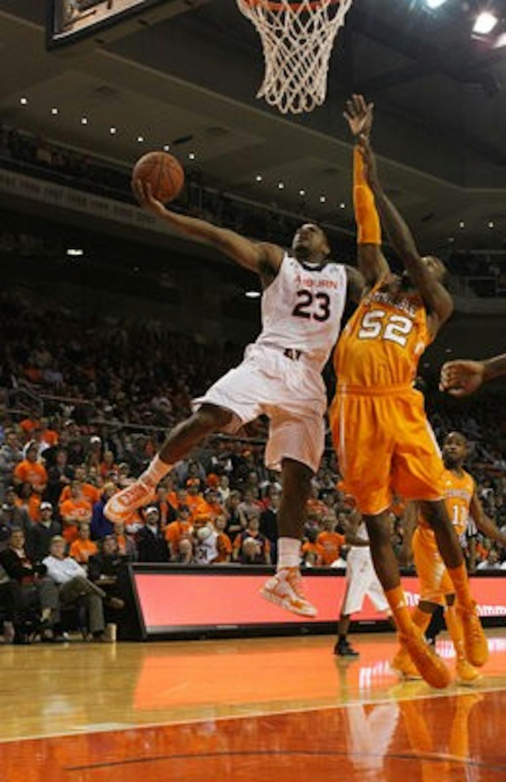 Frankie Sullivan reaches above a Tennessee defender in hopes to give the Tigers two points at his last home game. (Katherine McCahey / ASSISTANT PHOTO EDITOR)