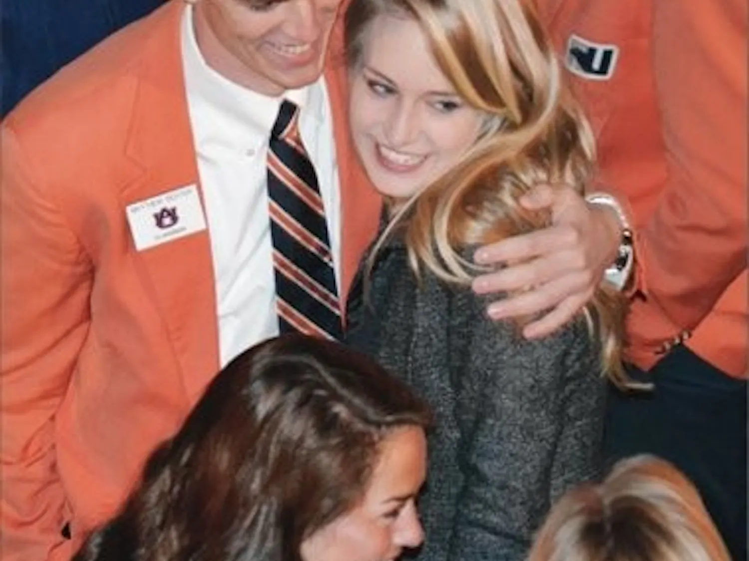 Tara Jones celebrates with Mathew Richter after being announced
Miss Auburn for 2013. (Raye May / PHOTO EDITOR)