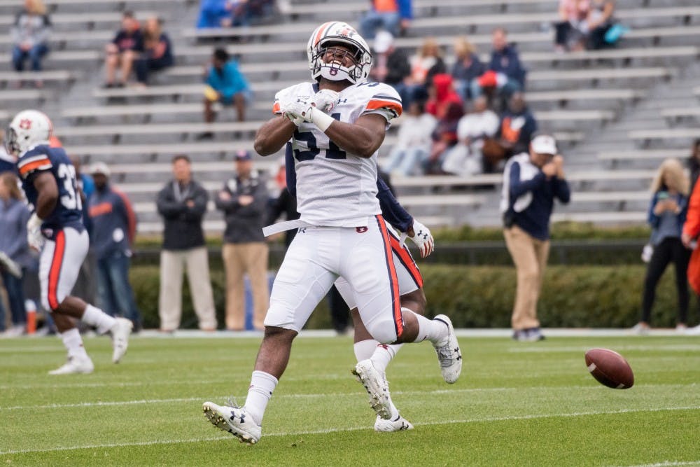 Richard McBryde (51) reacts after breaking up a play&nbsp;during Auburn's A-Day game on Saturday, April 7, 2018, in Auburn, Ala.