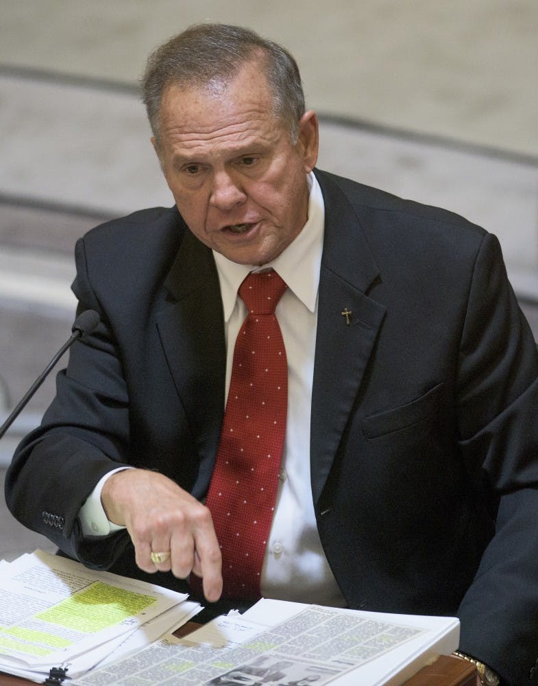 Embattled Alabama Chief Justice Roy Moore testifies during his ethics trial at the Alabama Court of the Judiciary at the Alabama Judicial Building in Montgomery, Ala., on Wednesday September 28, 2016.