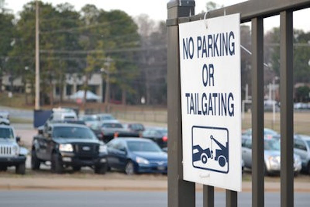 Parking Services has made $400,000 from tickets since fall 2012 and insist they are only doing their job. (Raye May / PHOTO EDITOR)