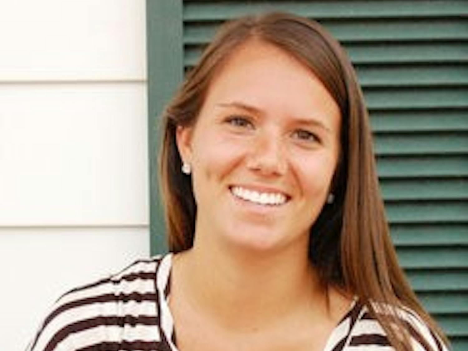 Megan Abato, junior in early childhood education, participates with the organization Invisible Children, which helps educate children in Uganda. (Charlie Timberlake / ASSISTANT PHOTO EDITOR)