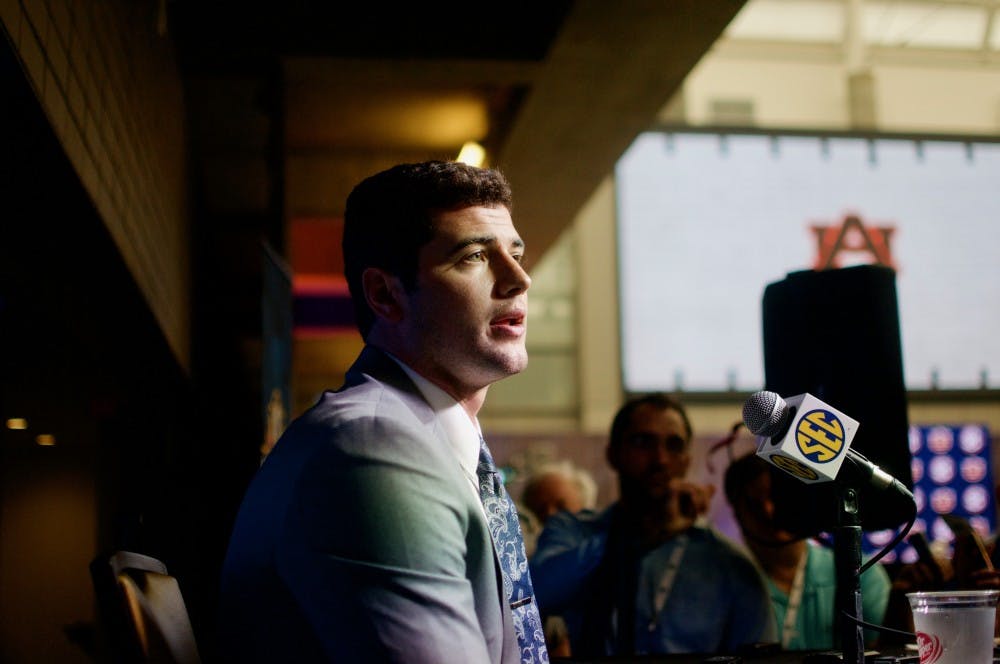 <p>Jarrett Stidham answers a question during an interview at SEC Media Days in the College Football Hall of Fame on Thursday, July 19, 2018 in Atlanta, Ga.</p>