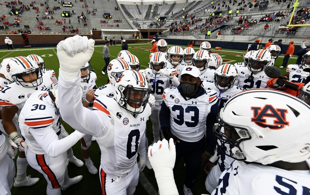 Team huddle before the game during the game between Auburn and Ole Miss at Vaught Hemingway Stadium on Oct 3, 2020; Oxford, MS, USA. 
