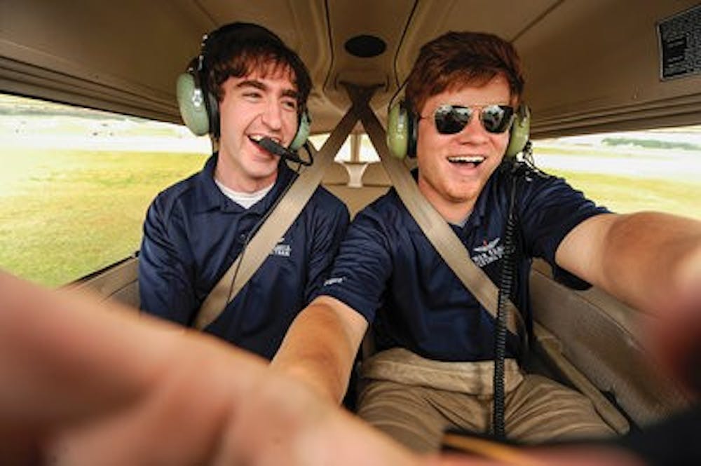 Jared Lockhart (left) and Kevan (Will) Leveille (right) are commercial students in the program and committee members of the War Eagle Flying Team. (Contributed by Camille Barkley)
