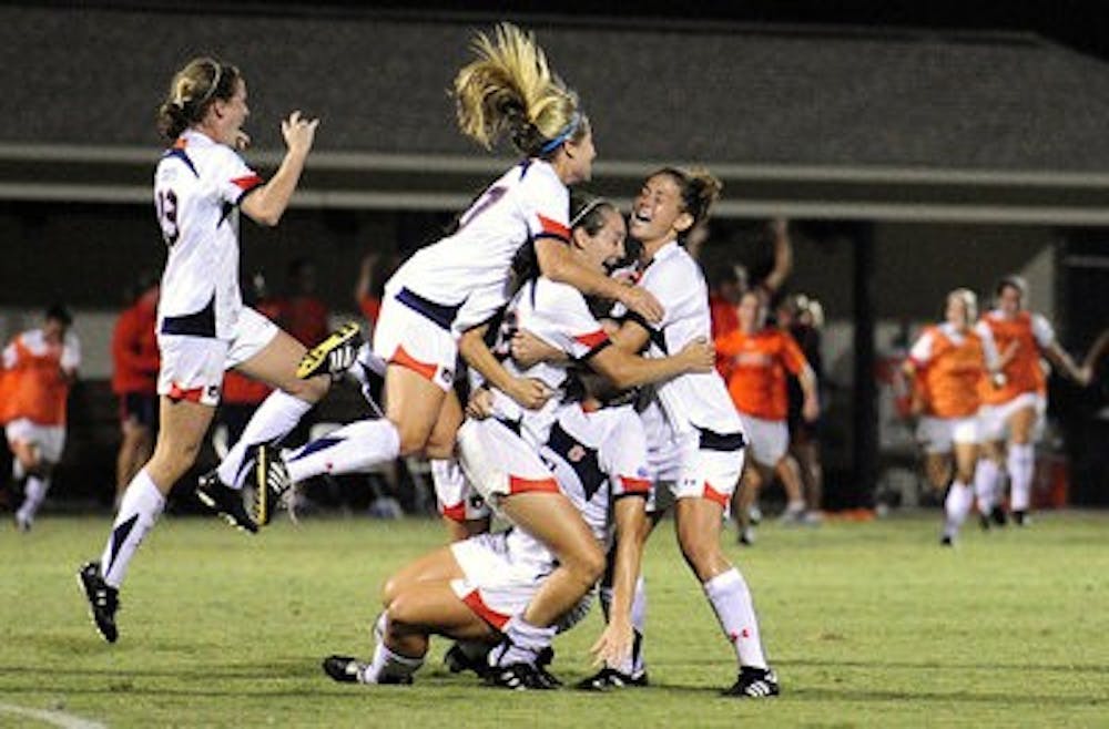 Katy Frierson celebrates with her teammates after scoring the winning goal in overtime against FSU earlier this season. (Todd Van Emst / Media Relations)
