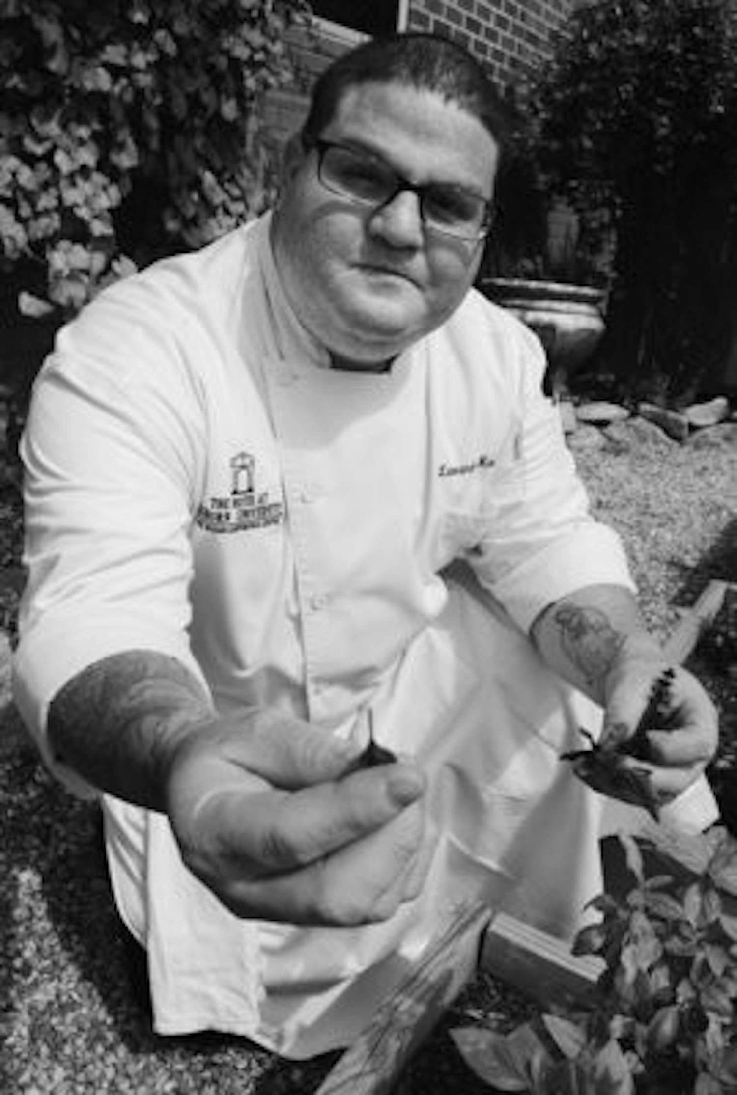 Leonardo Maurelli, chef at Ariccia, will use fresh herbs from a garden at the Auburn Hotel and Dixon Conference Center to prepare dishes for Oktoberfest. (Maria Iampietro / PHOTO EDITOR)