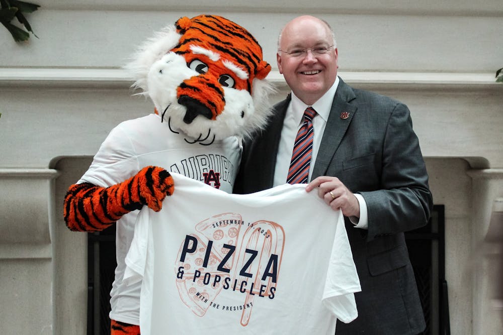 <p>President Christopher Roberts and Aubie the Tiger at Pizza and Popsicles with the President on Sept. 13, 2023.</p>