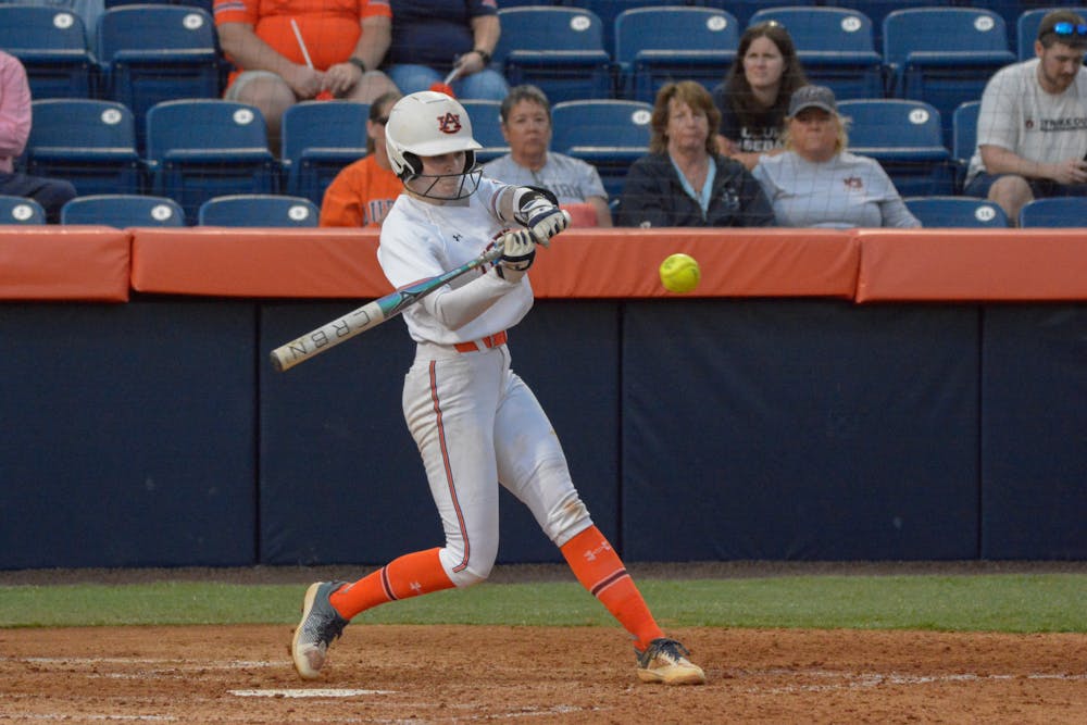 <p>Aubrie Lisenby at bat that resulted in a double base play against Bowling Green on March 3rd 2023</p>