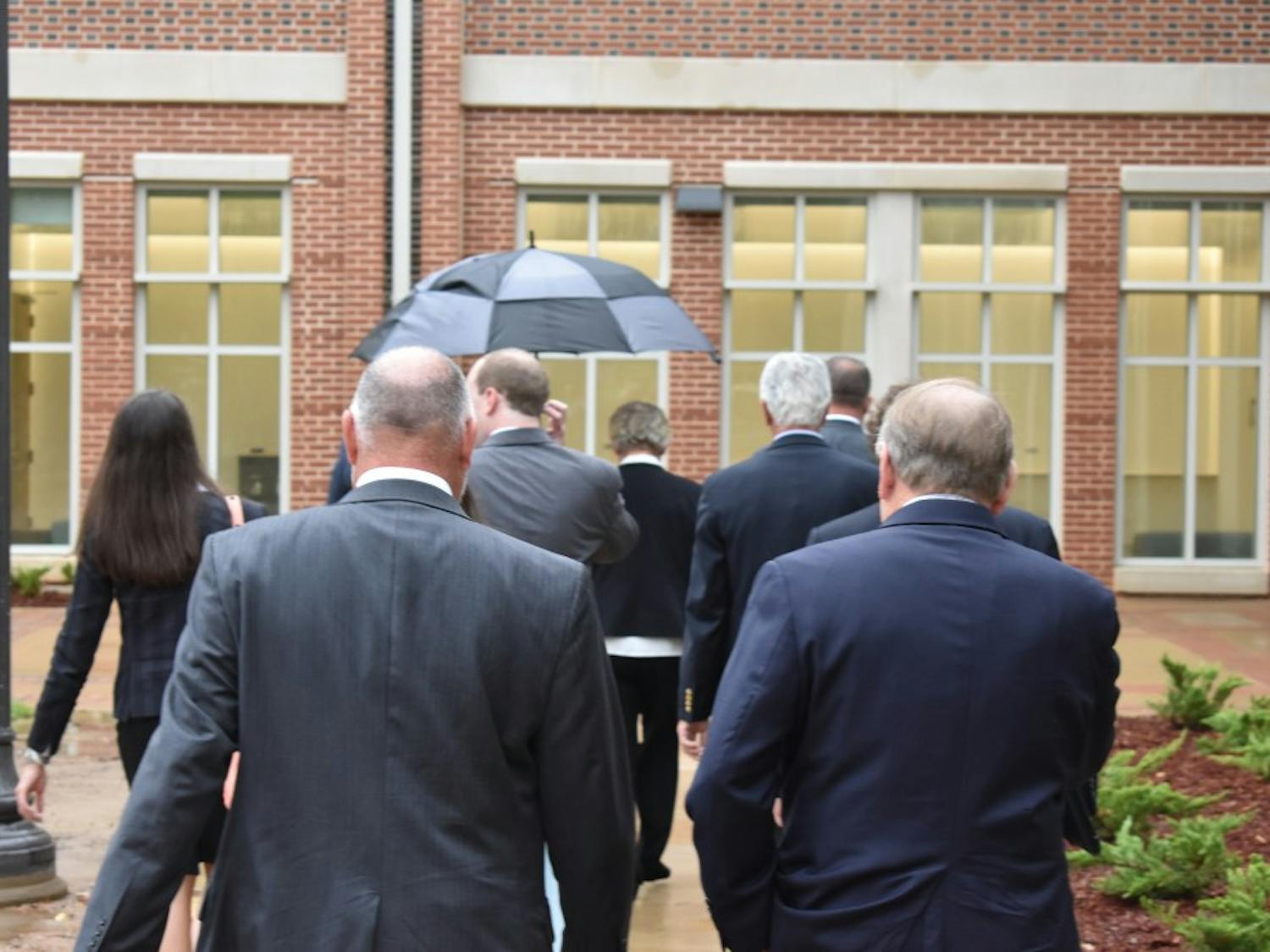 Gov. Kay Ivey is followed by Mayor Bill Ham and Auburn University President Steven Leath while touring the University's new School of Nursing building on July 25, 2017 in Auburn, Ala.