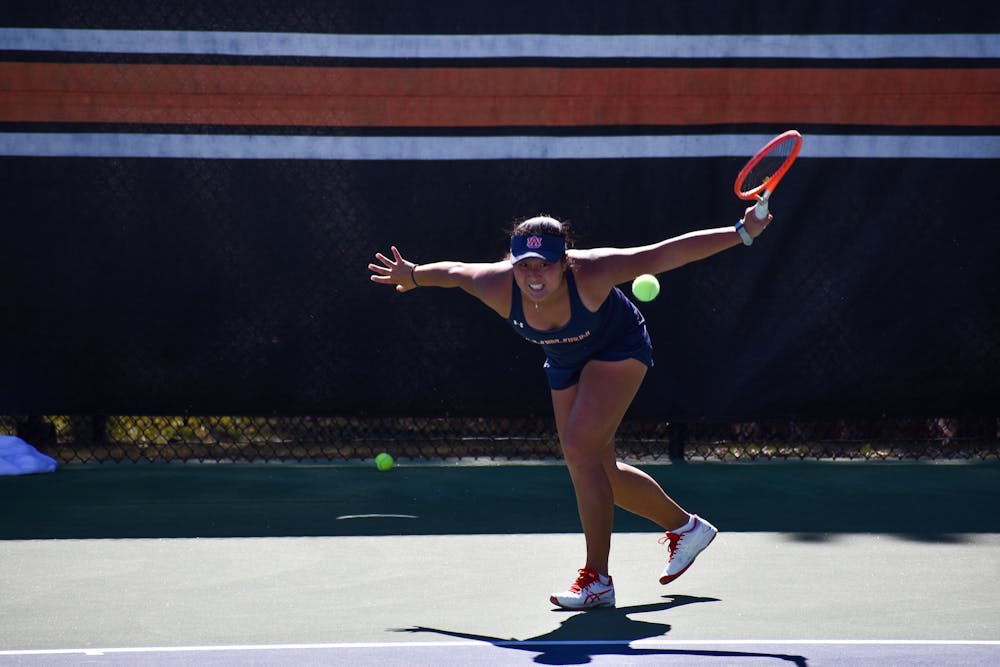 February 6, 2022; Auburn, Alabama; Yu Chen slices a ball in a singles match between Auburn and Clemson at the Yarbrough Tennis Center.