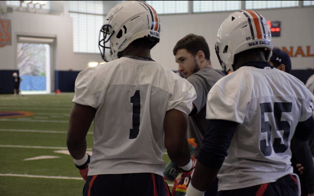 Big Kat Bryant (1) and T.D. Moultry (55)&nbsp;during Auburn football spring practice on March 1, 2018 in Auburn, Ala.