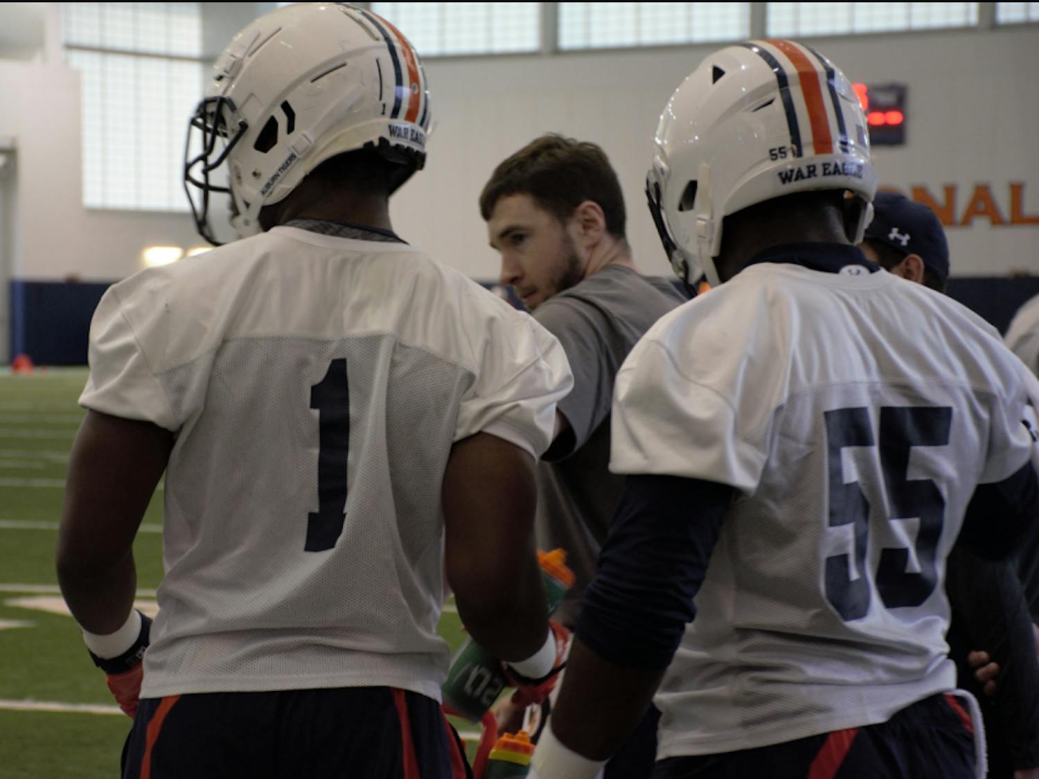 Big Kat Bryant (1) and T.D. Moultry (55)&nbsp;during Auburn football spring practice on March 1, 2018 in Auburn, Ala.