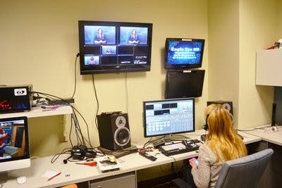 Emily Johnson, junior in agriculture communications, edits an Eagle Eye segment Friday afternoon. Eagle Eye staff hope to purchase new equipment and software to more closely resemble a professional news network. The purchase would cost approximately $85,000. (Danielle Lowe / ASSISTANT PHOTO EDITOR)