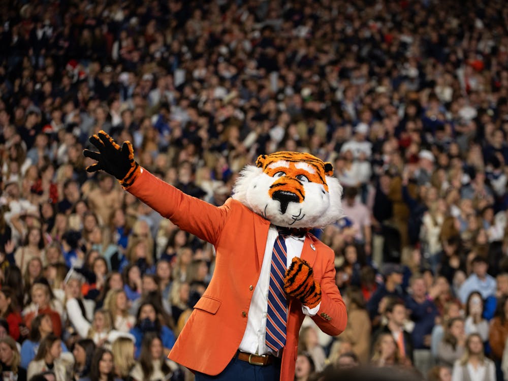 Aubie hyping up the student section during the 2023 Iron Bowl game