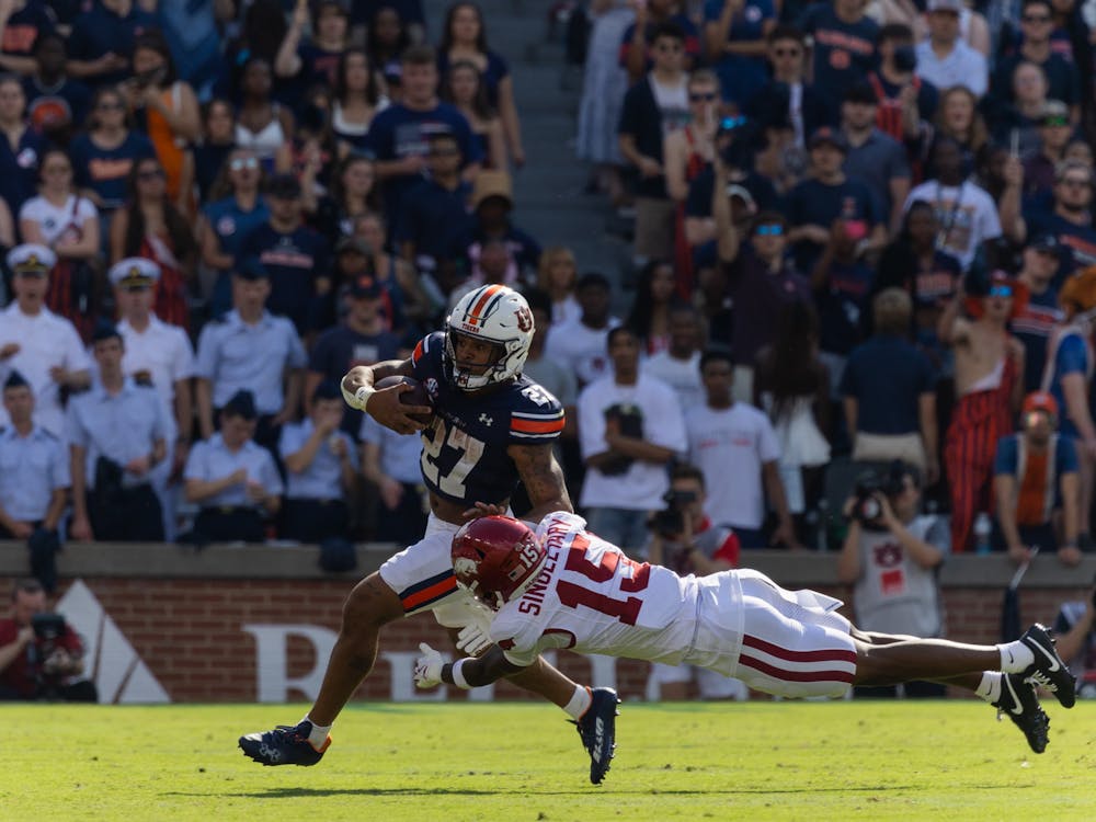 <p>Running back Jarquez Hunter avoids a tackle during Arkansas at Auburn on Sept 21, 2024.</p>