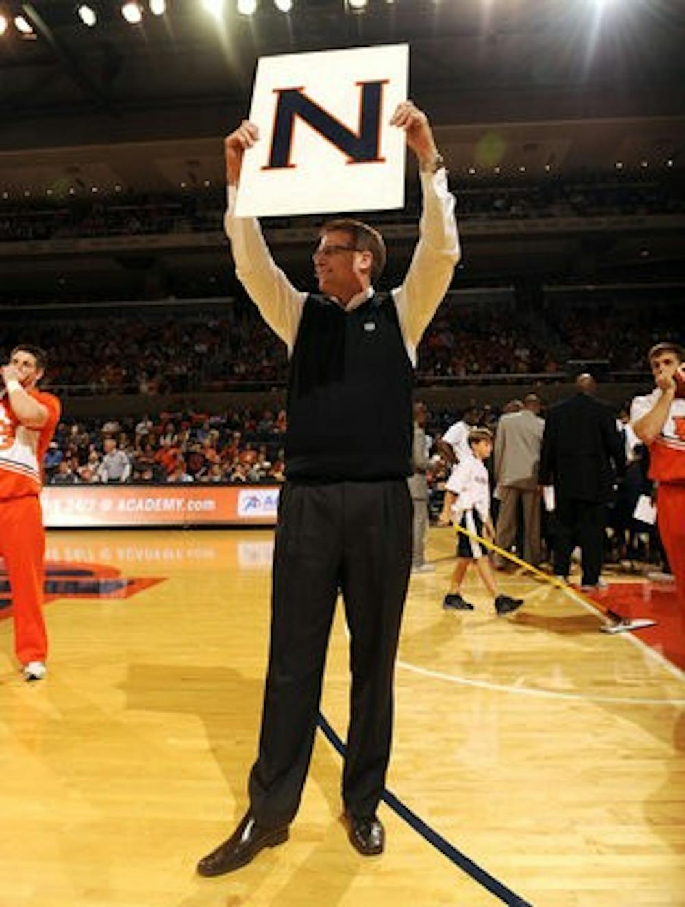 Malzahn pumps fans up at the Ole Miss basketball game Saturday, Jan. 26. (Courtesy of Todd Van Emst)