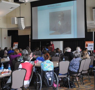 Participants watch a presentation at Alabama Assistive Technology Expo and Conference. (Elaine Busby / Assistant photo editor)