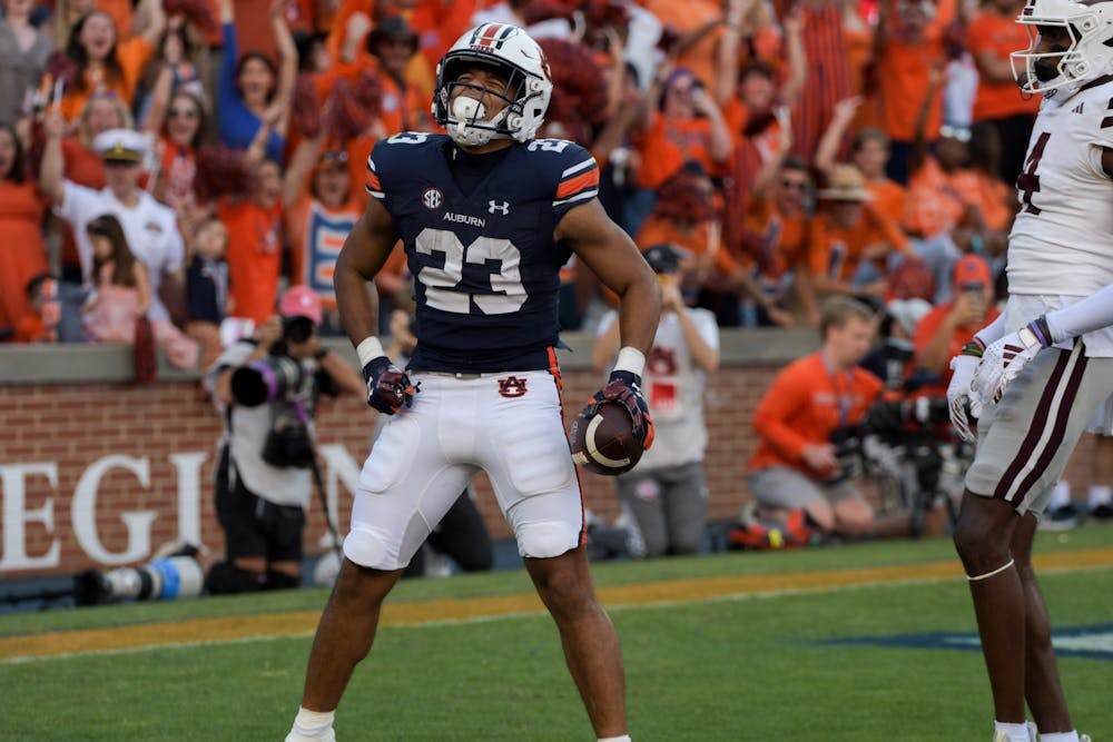 <p>Jeremiah Cobb (#23) celebrating a touchdown during Auburn's game against Mississippi State on October 28, 2023.&nbsp;</p>