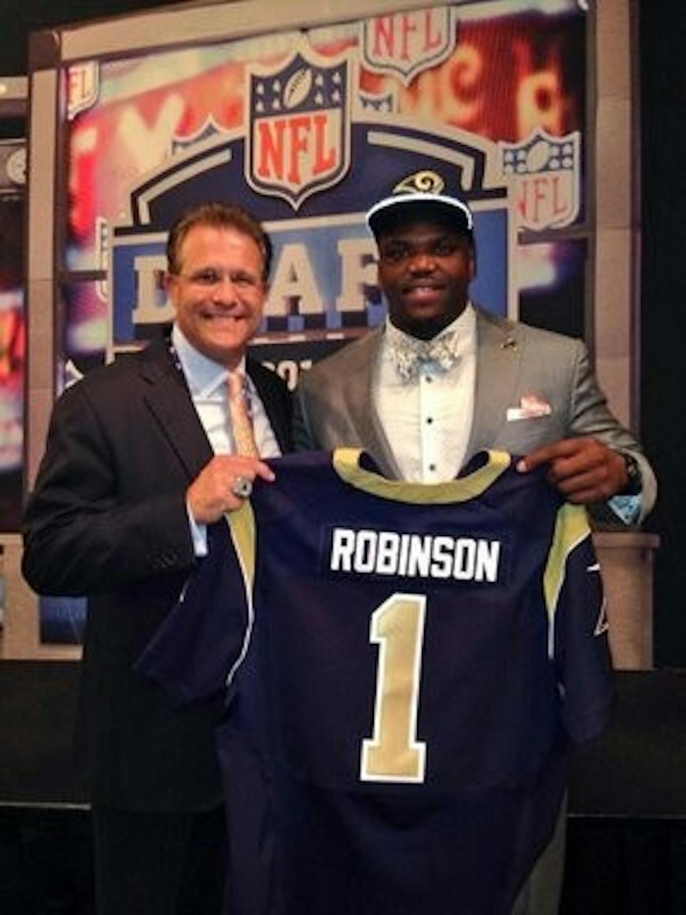 Auburn head coach Gus Malzahn with Greg Robinson after the St. Louis Rams chose the offensive tackle with the second overall pick (@CoachGusMalzahn)