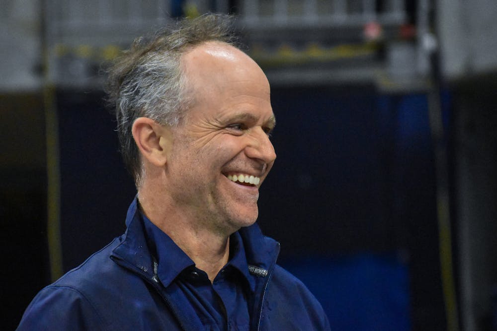 <p>Auburn head coach Jeff Graba shares a smile after it was announced that Auburn would advance to the Elite 8 during the NCAA Women's National Gymnastics Sweet 16 in the Neville Arena in Auburn, Alabama.</p>