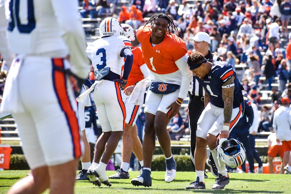 <p>T.J. Finley (1) and Donovan Kaufman (1) celebrate after the conclusion of the 2022 A-Day game in Jordan-Hare Stadium in Auburn, Alabama, on April 9, 2022.</p>