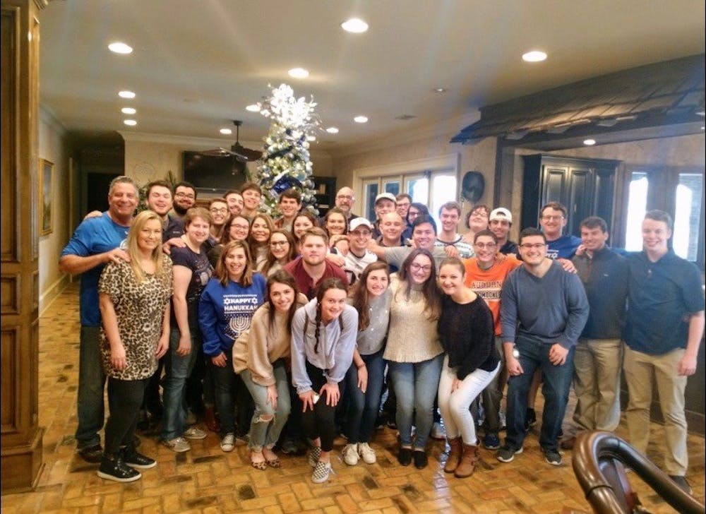 <p>Contributed by Clio Straus&nbsp;</p>
<p>Hillel gathered at Bruce Pearl's Hanukkah party.</p>