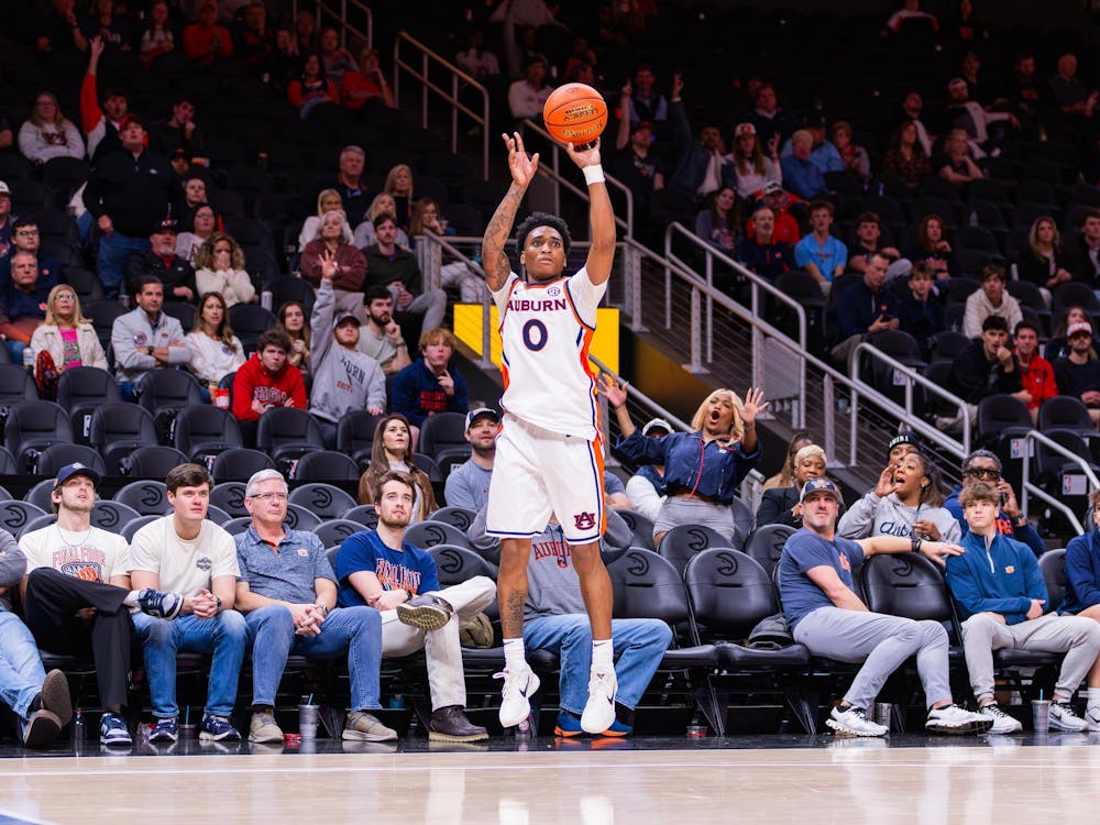 Tahaad Pettiford lines up a three against Chattanooga on Dec. 13, 2025.